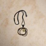 Abstract Swirl Pendant Necklace – Black Cord with Metallic Rings & Pearl Drop